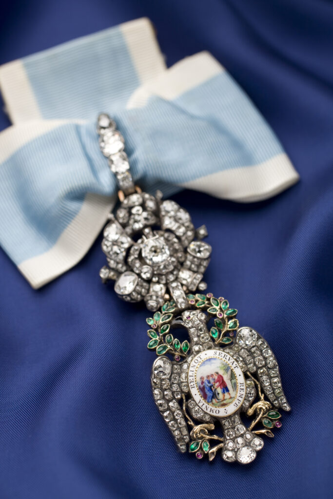 Click for a larger view. Diamond Eagle of the Society of the Cincinnati on a modern blue-and-white ribbon