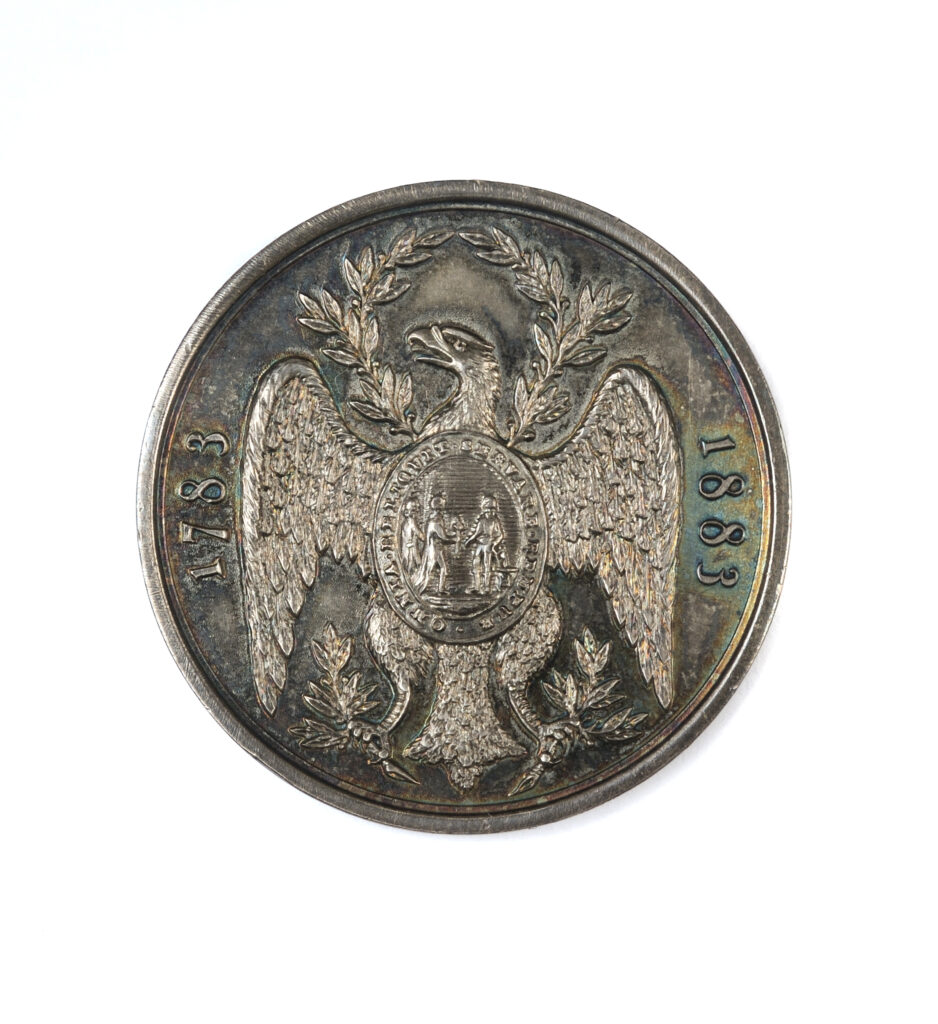 Click for a larger view. Circular silver medal with eagle-shaped insignia of the Society of the Cincinnati