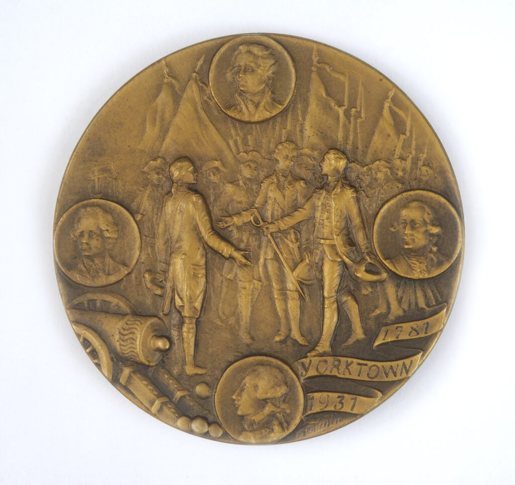 Click for a larger view. Circular bronze medal picturing the British surrender at Yorktown